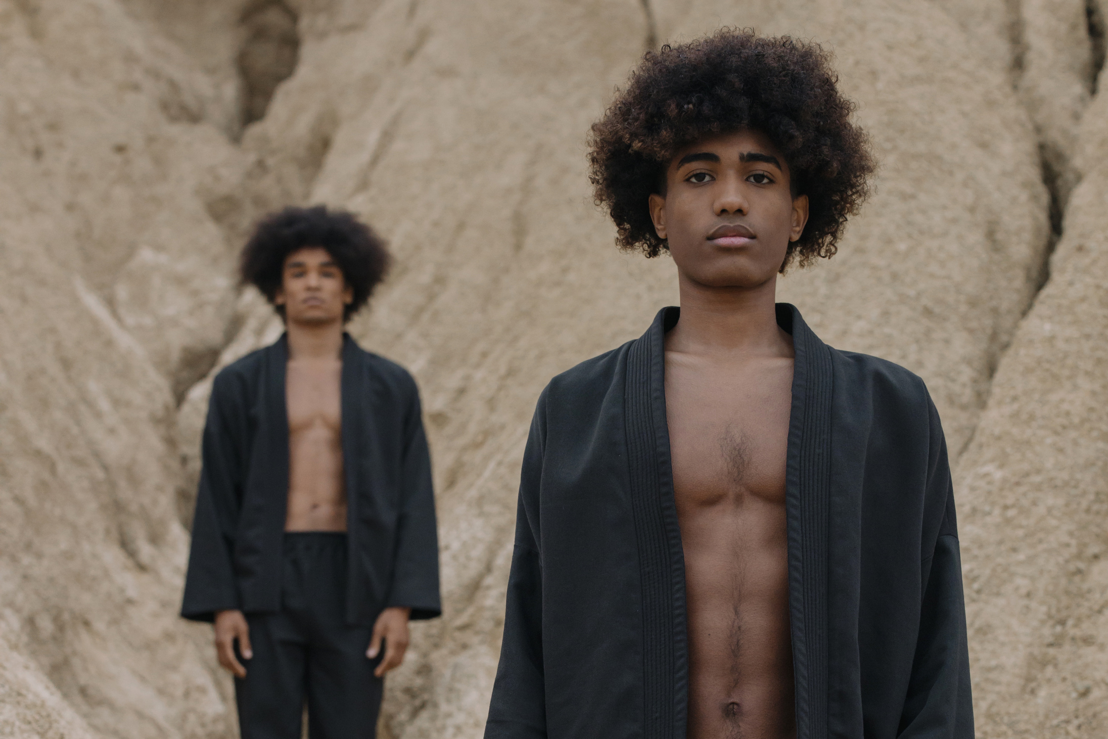 Close-up Photo of Men in Black Kimono
